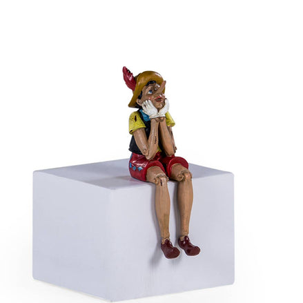 Antiqued Sitting Pinocchio Figure